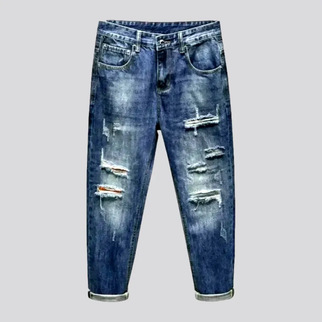 Distressed sanded jeans for men