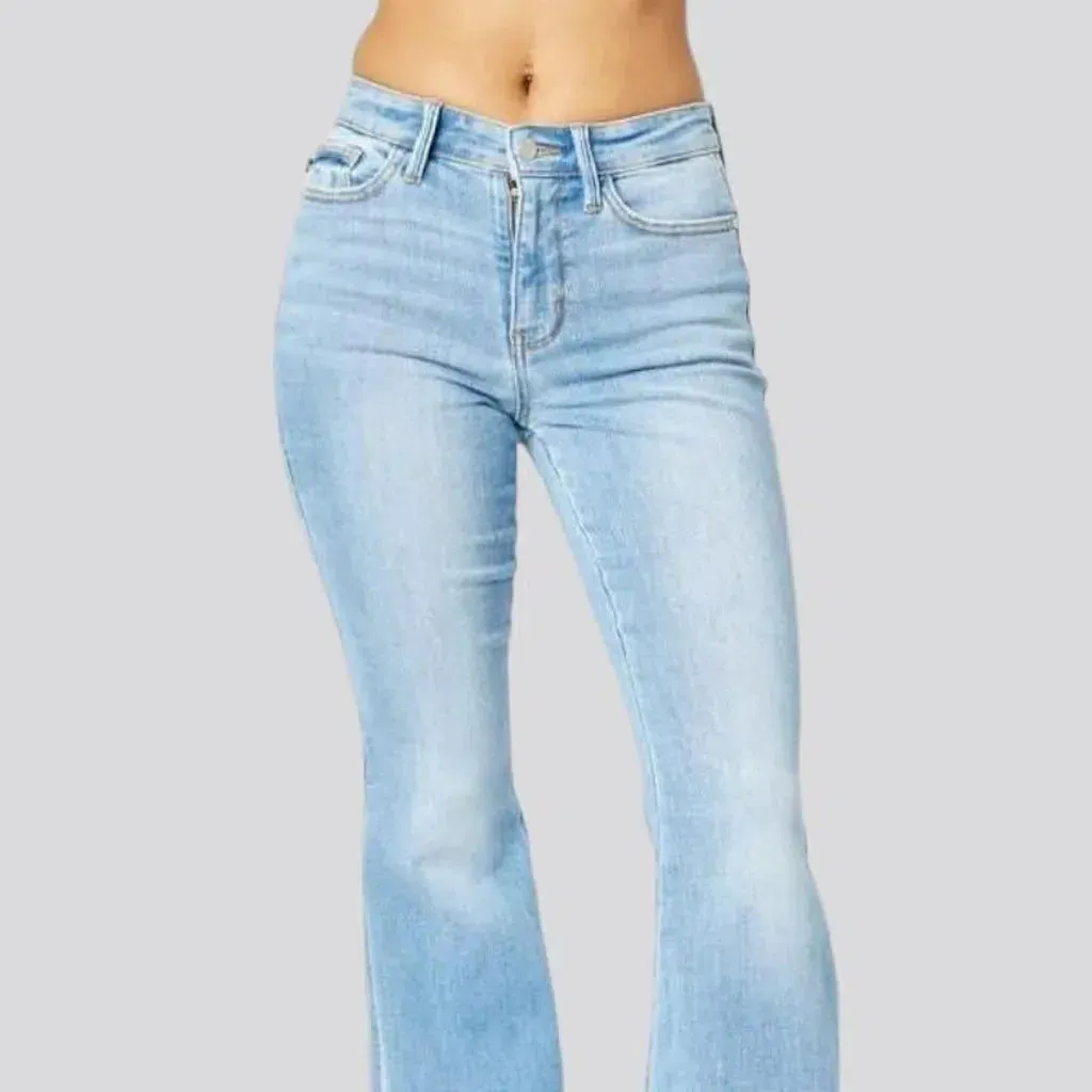 Light-wash sanded jeans
 for women